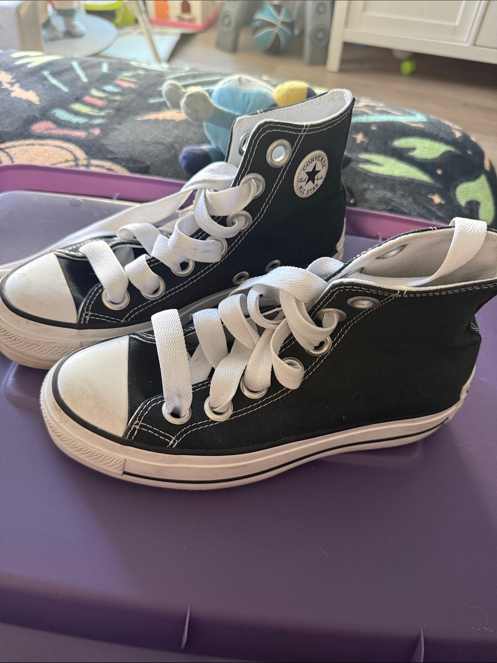 Converse women’s Black and White High-Top Sneakers